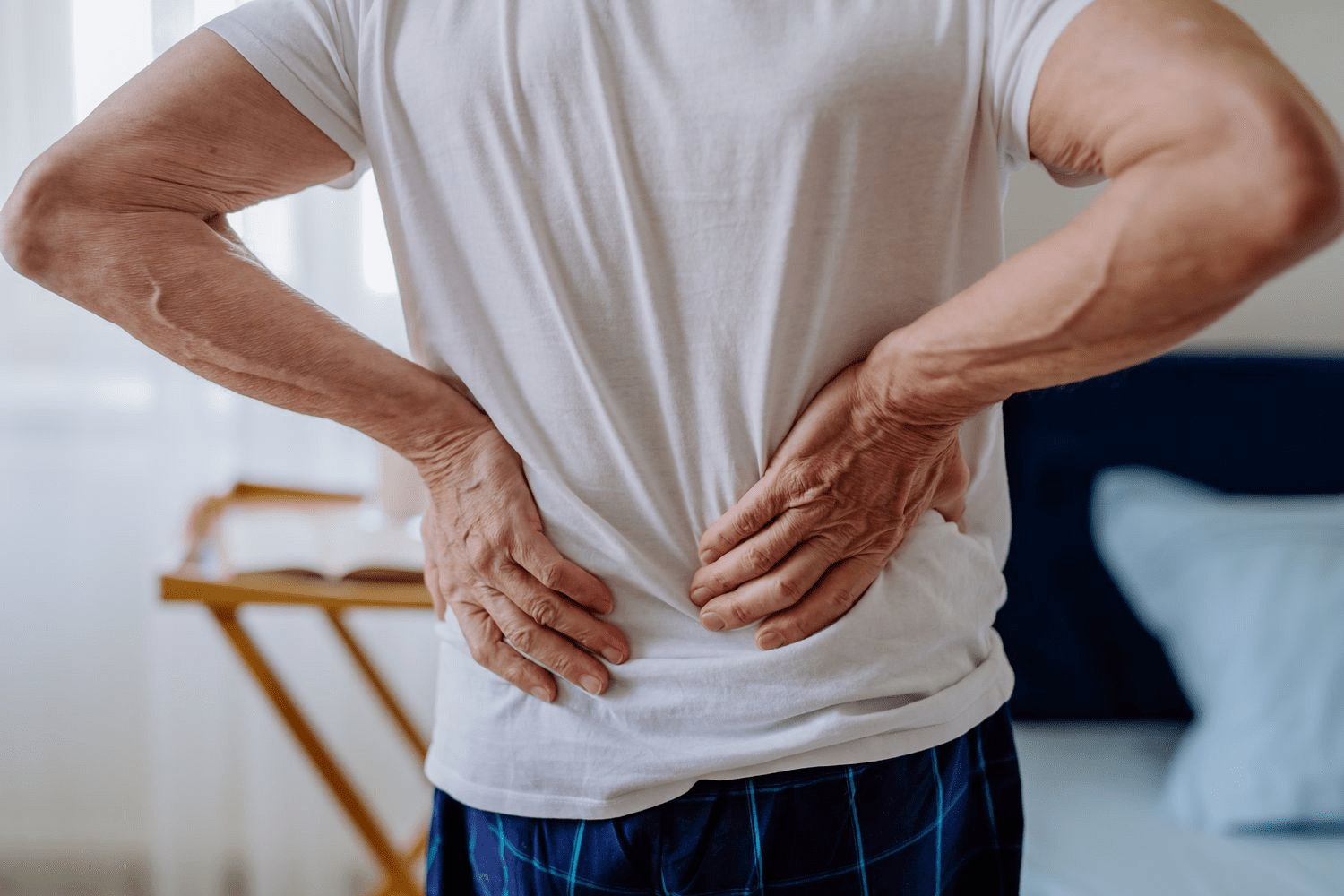 Patient undergoing spinal decompression treatment session to help relieve back pain and spinal pressure